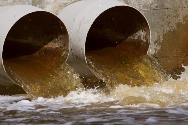 A pipe discharging into a waterway